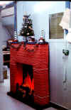 Christmas_70_rsemen_OR_fireplace.jpg (32535 bytes)